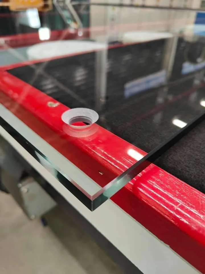 12 mm tempered glass panel with a polished edge and fixing hole