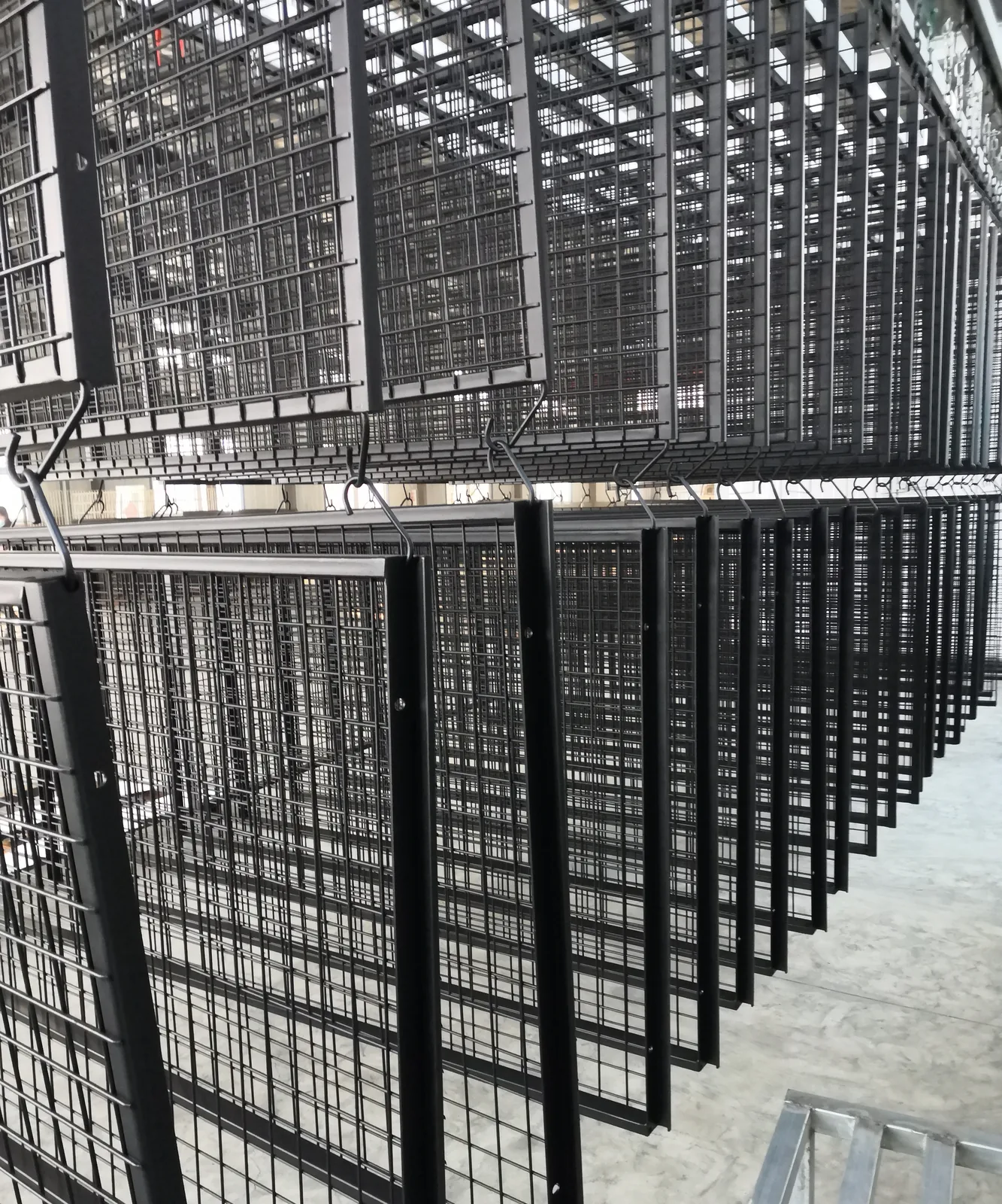 Steel padel frames with mesh fencing