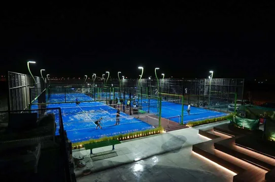 Padel courts lit at night in Kuwait